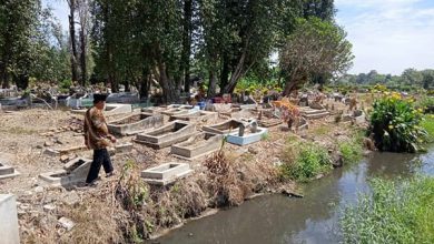 Photo of Puluhan Makam Terbawa Arus Irigasi di Tanjung Morawa