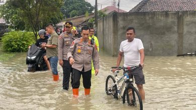 Photo of Kapolresta Deli Serdang Tinjau Lokasi Banjir di Lubuk Pakam