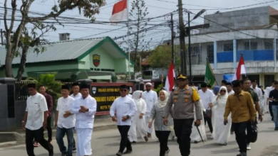 Photo of Wali Kota Tanjung Balai Jalan Kaki Ikut Pawai Taaruf MTQN ke 56