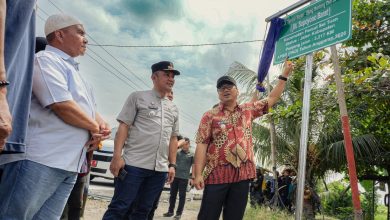 Photo of Asri Ludin Tambunan Resmikan Lebih dari 18,4 Km Jalan di Percut Sei Tuan